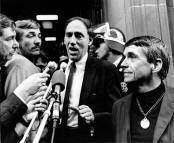 Rev. Daniel Berrigan, right, speaks to media with his lawyer after being convicted for burning draft records