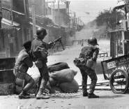 South Vietnamese in the streets of Cholon during Tet Offensive
