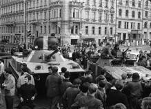 residents try to stop a Soviet tank from entering downtown Prague