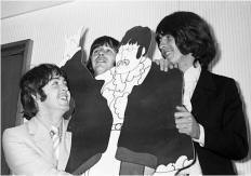 Paul McCartney, Ringo Starr and George Harrison at the launch of Yellow Submarine in Knightsbridge, London